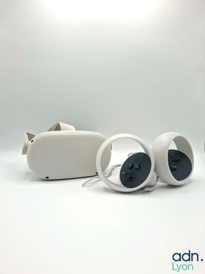 two speakers sitting next to each other on a white surface