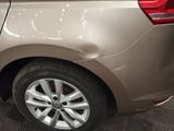 a close up of a car ' s tire on the floor