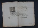an old book with writing on it sitting on a table