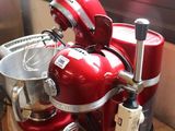 an image of a kitchen counter with a red mixer and a bowl
