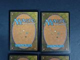 three decks of magic the gathering deck are shown on a table