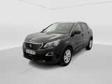 the black car is parked in a white room with a white floor