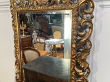 a mirror on a table in a room