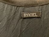 the label of a black shirt with white writing on it
