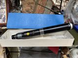 a pen that is sitting in a box on a table