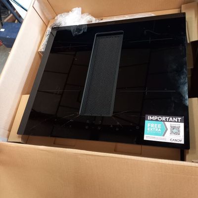 a box that has a microwave inside of it