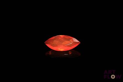 an orange diamond on a black background