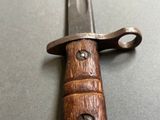 a close up of a knife on a table