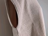 the back of a sweater hanging on a mannequin mannequin mannequin mannequin mannequin mannequin mannequin mannequin
