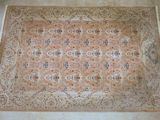 a rug on the floor in the middle of the room