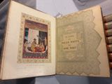 un livre ouvert avec la photo d'un homme et d'une femme