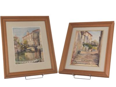 pair of watercolor paintings of a street scene in a wooden frame