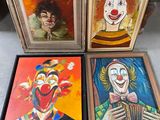 three framed paintings of clowns and a man with a top hat