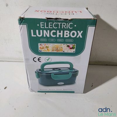 une boîte à repas électrique dans la boîte posée sur la table