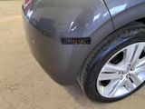 a close up of a car ' s bumper with a sticker on it