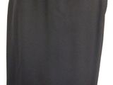 black skirt on a mannequin stand on a white background