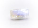 an image of a ring with a white and blue stone