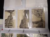 a bunch of old photos hanging on a wall
