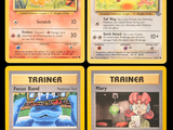 four different pokemon cards are shown in a row on a black background