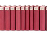 six red books lined up in a row on a white surface