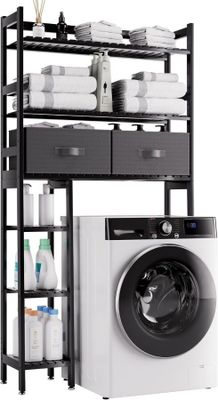 une photo d'une buanderie avec une machine à laver et un sèche-linge