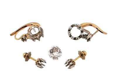three pairs of gold and diamond earrings on a white background