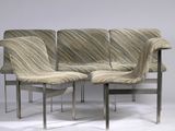 three chairs with a striped upholstered seat and a metal frame