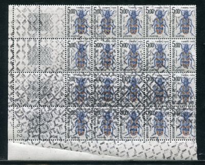 a stamp with a blue and white design on it