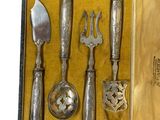 a box with a set of silverware in it