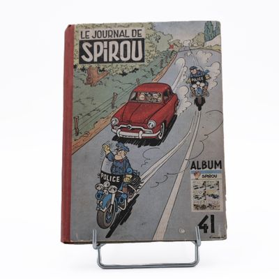 a book with a picture of a man on a motorcycle on the cover