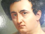 une peinture représentant une femme avec une fleur dans les cheveux