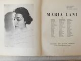 an open book with a black and white photo of a woman ' s face