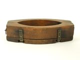 an image of a wooden ashtray with metal handles on a white background