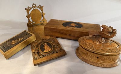 a wooden box with a bird on it and a box with a bird on it and a box with a bird on it and a wooden box with a