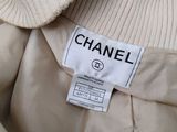 the label on a chanel jacket is clearly visible