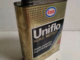a can of oil that is sitting on a table