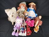 a lot of dolls that are sitting together on a black background