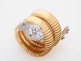 an image of a gold snake ring with diamonds on it