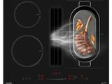 une photo en gros plan d'une plaque de cuisson sur laquelle cuit un plat