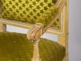 an image of a chair with a green upholstered upholstered seat