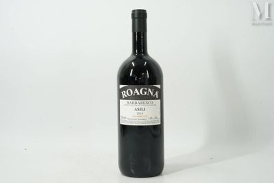 a bottle of wine that is sitting on a table