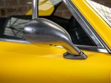 a close up of a car ' s side mirror on the side of the car