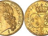 an image of a gold sovereign coin with a crown on it