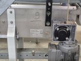 an image of a machine that is working on a piece of metal