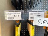 a display of skis and ski poles in a store