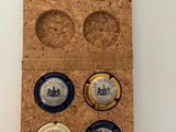 a cork case with four different types of watches