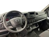 the interior of a car with a steering wheel and dashboard controls