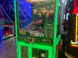 une console de jeux posée au milieu d'une pièce