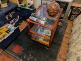 a living room with a couch, coffee table, and bookshelf