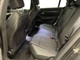 the back seats of a car are empty with no one in it